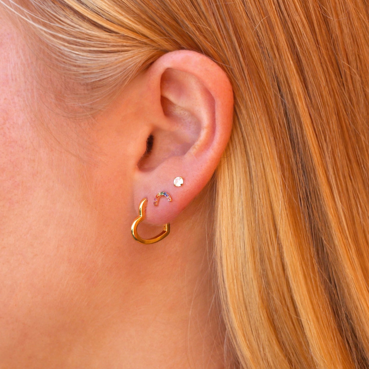 Open Hearted Hinged Huggie Hoop Earrings by Kris Nations