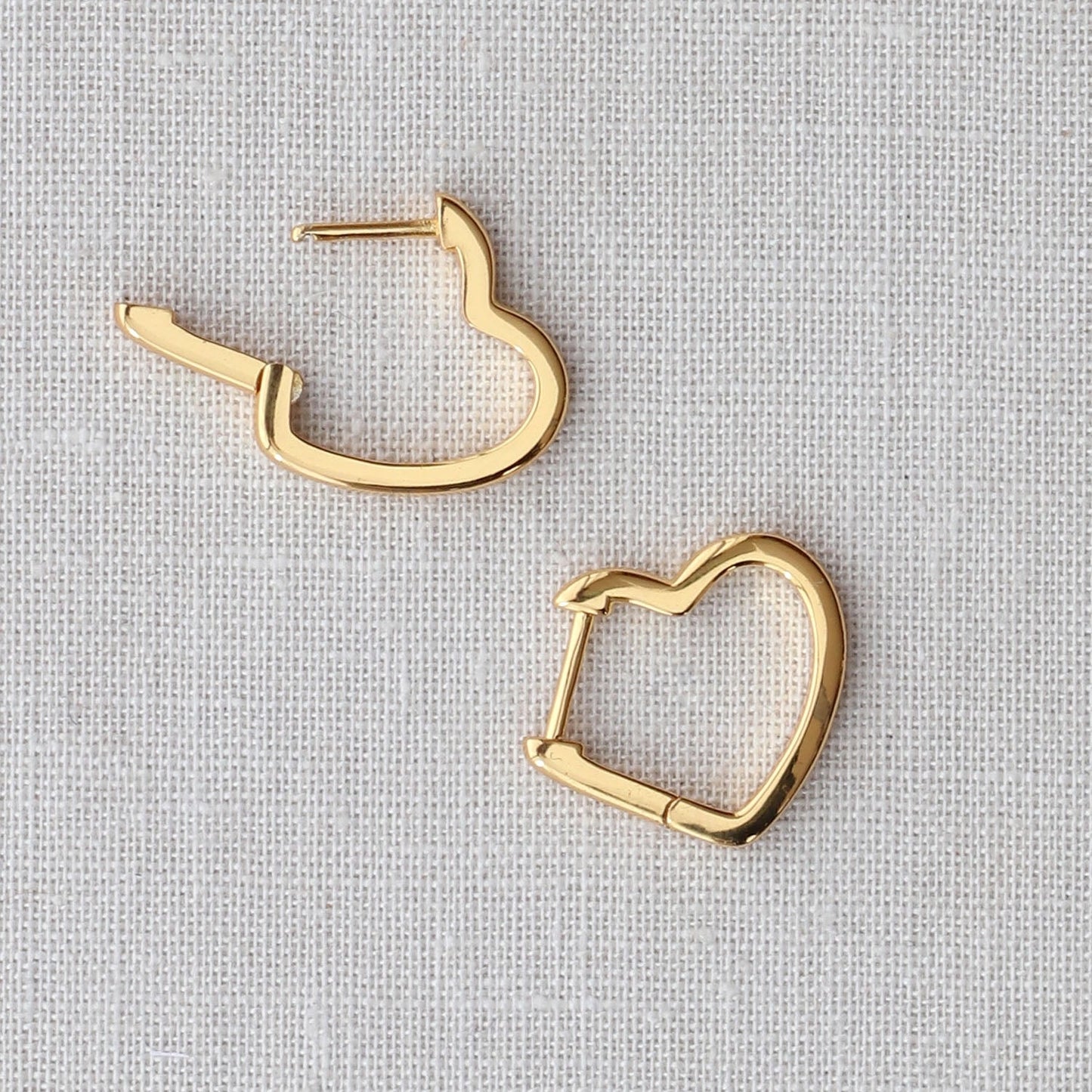 Open Hearted Hinged Huggie Hoop Earrings by Kris Nations