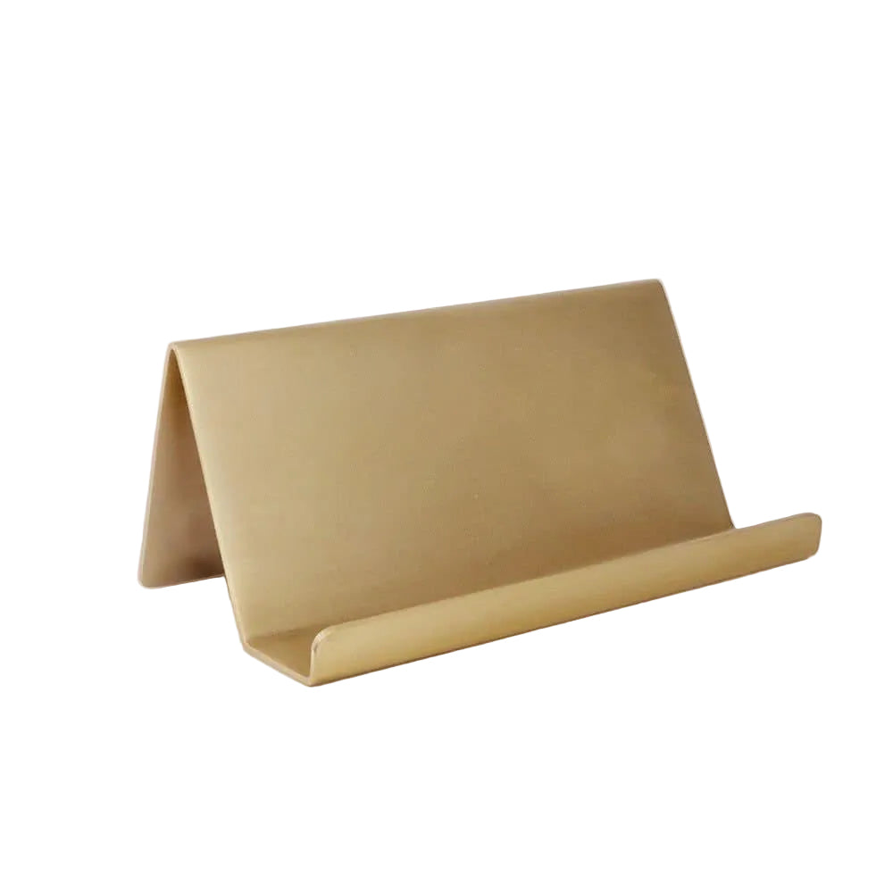 Gold satin brass metal stand on a white background